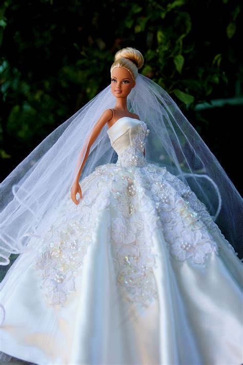 White wedding dress & veil fits Barbie size dolls. . Barbie doll in wedding dress